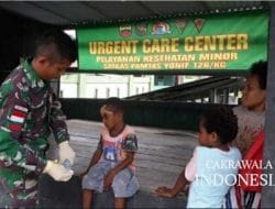 Satgas Pamtas Yonif 126/KC Berikan Pengobatan Terbaik untuk Anak Papua